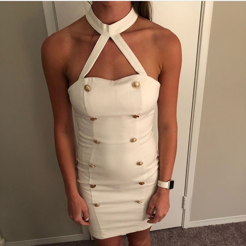 White dress with gold buttons